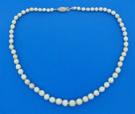 authentic pearl necklace identification.